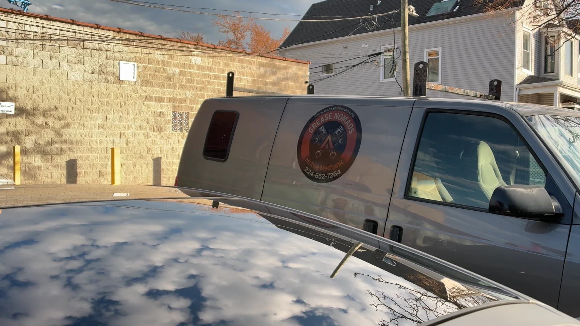 Grease Nomads service van positioned at a customer location