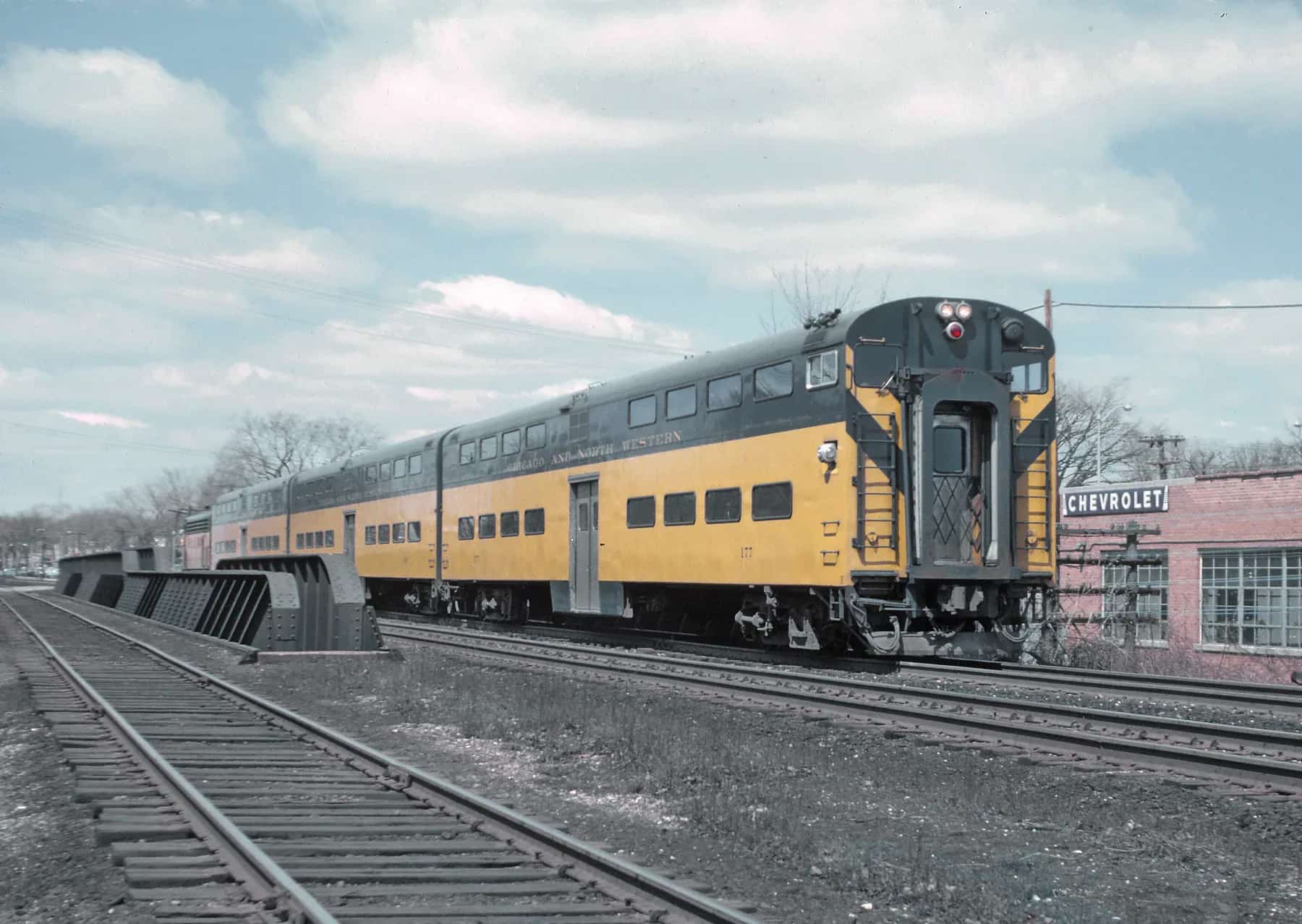 Chicago and North Western cab car 177 crossing the Des Plaines River at Des Plaines