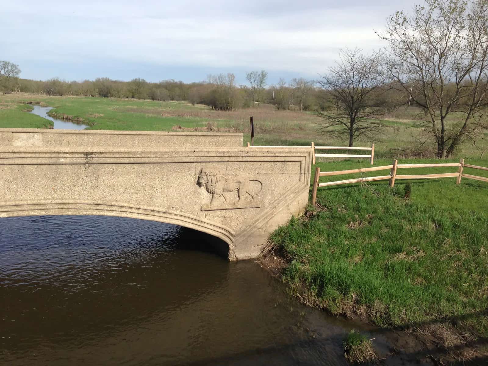Poplar Creek landscape and bridge within Arthur L. Janura Preserve in Hoffman Estates