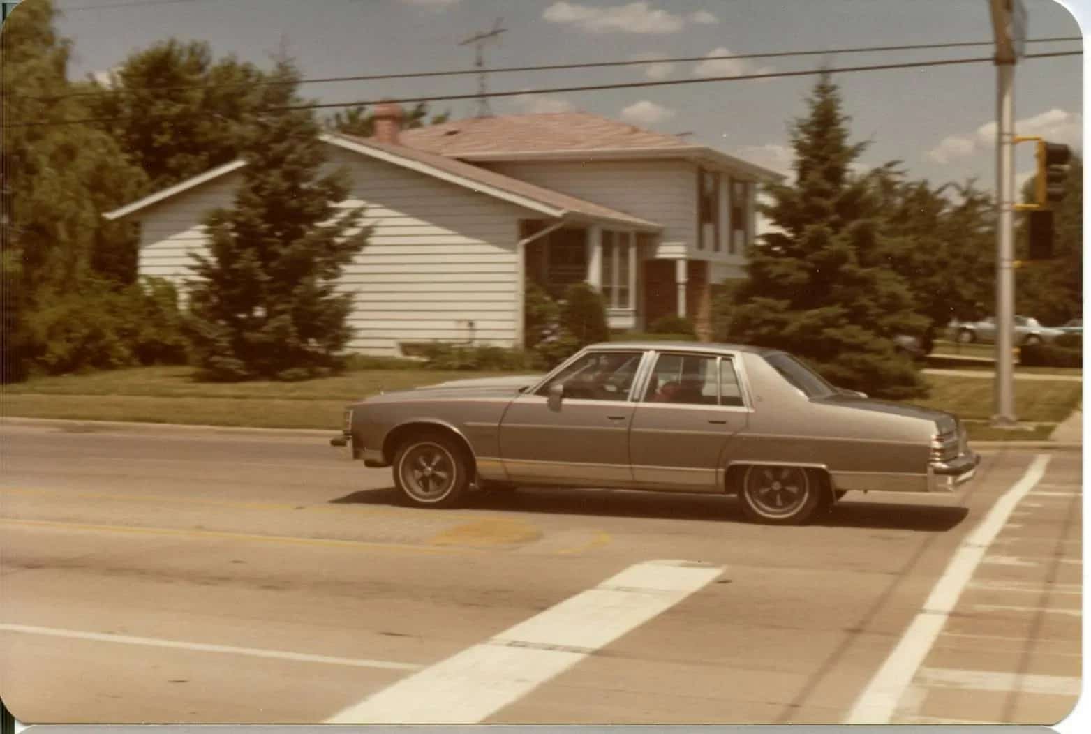 A Mount Prospect home, lawn, and family car at Euclid Avenue and Burning Bush Lane in summer 1979