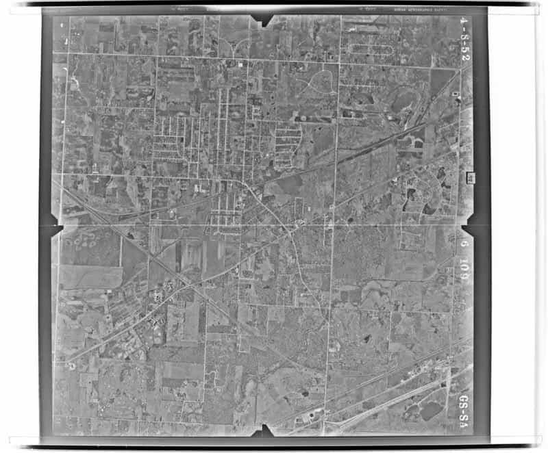 Northbrook village center, new subdivisions, rail corridor, roads, and remaining fields
