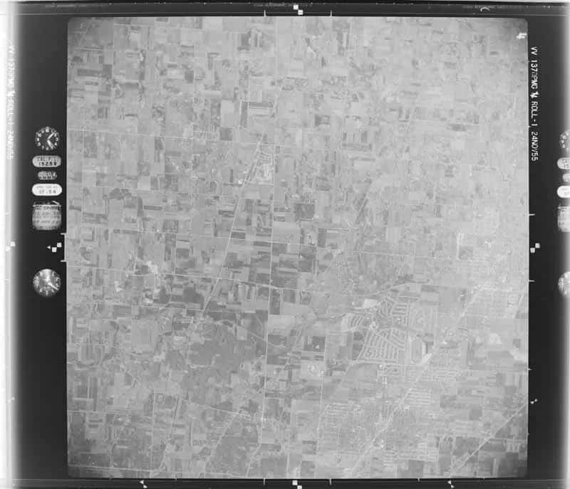 Complete federal aerial photograph of Schaumburg rural fields, crossroads, and early subdivision streets before incorporation